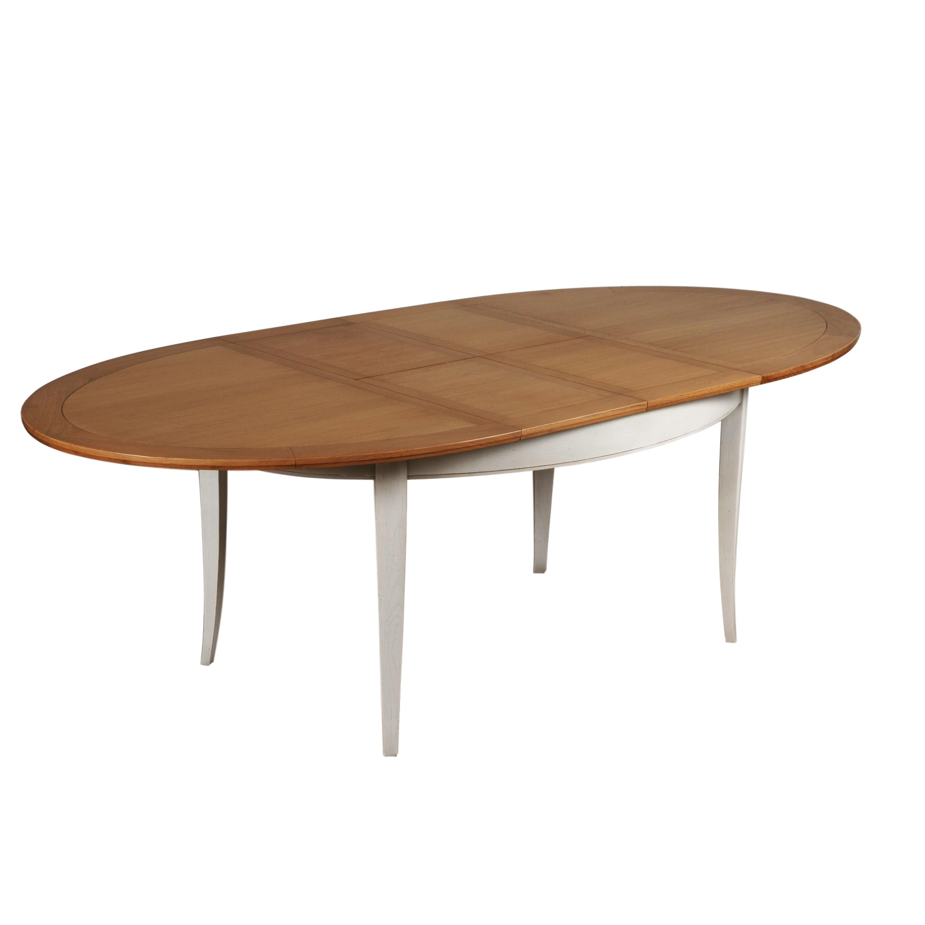 https://a.1stdibscdn.com/oval-table-in-solid-oak-2-extensions-chestnut-stained-pearl-grey-lacquered-for-sale-picture-2/f_57342/f_264796321639153605594/RIV_5701CCHGP_Table_ovale_biais_2_allonges_d_pli_es_bi_ton_ch_ne_ch_taigne_gris_perle_3000x3000_master.jpeg