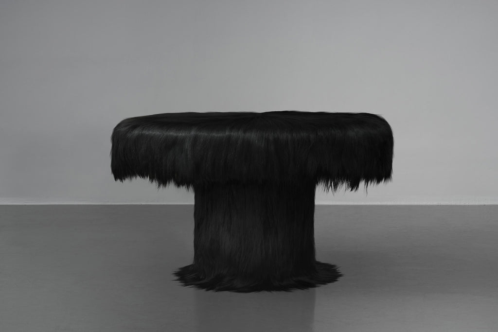 https://a.1stdibscdn.com/black-raw-table-with-furry-goatskin-and-nubuck-by-atelier-vf-for-sale-picture-3/f_70152/f_337756321681323323872/ROG_B_04_table_master.jpg