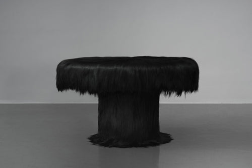 https://a.1stdibscdn.com/black-raw-table-with-furry-goatskin-and-nubuck-by-atelier-vf-for-sale-picture-3/f_70152/f_337756321681323323872/ROG_B_04_table_master.jpg