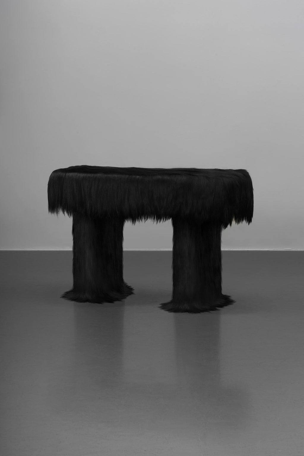 https://a.1stdibscdn.com/black-raw-table-with-furry-goatskin-and-nubuck-by-atelier-vf-for-sale-picture-2/f_70152/f_337756321681323323361/ROG_B_06_console_master.jpg