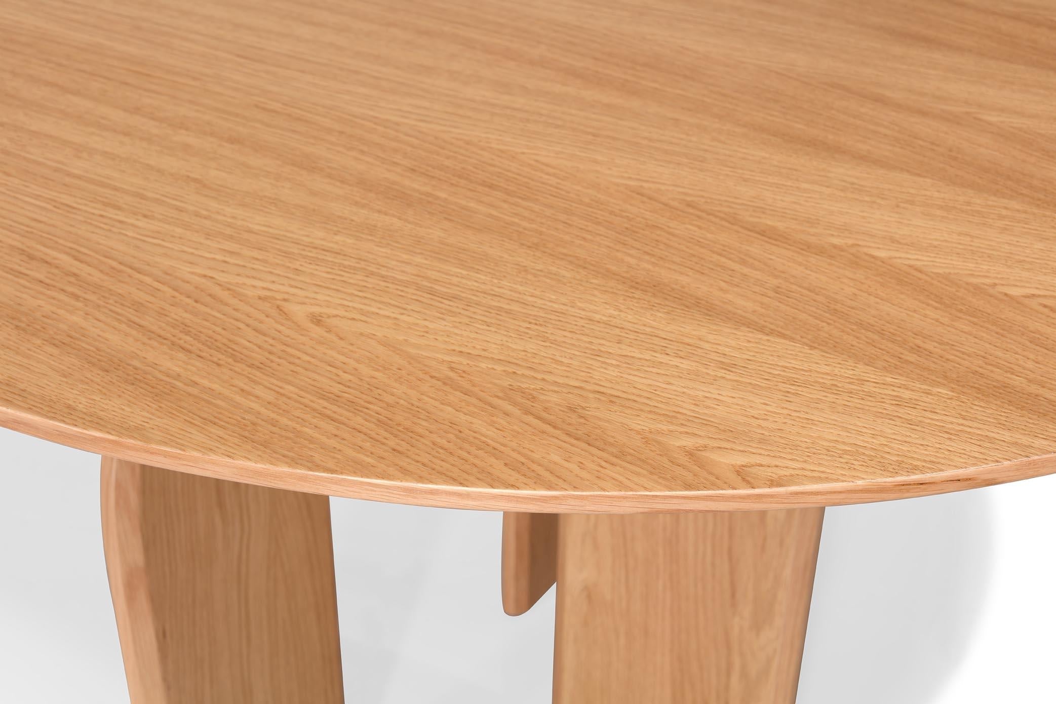 https://a.1stdibscdn.com/hana-dining-table-minimalist-harmony-in-oak-and-curves-for-sale-picture-4/f_102612/f_433118221737740424200/RUBENSILVA_0036068_master.jpg