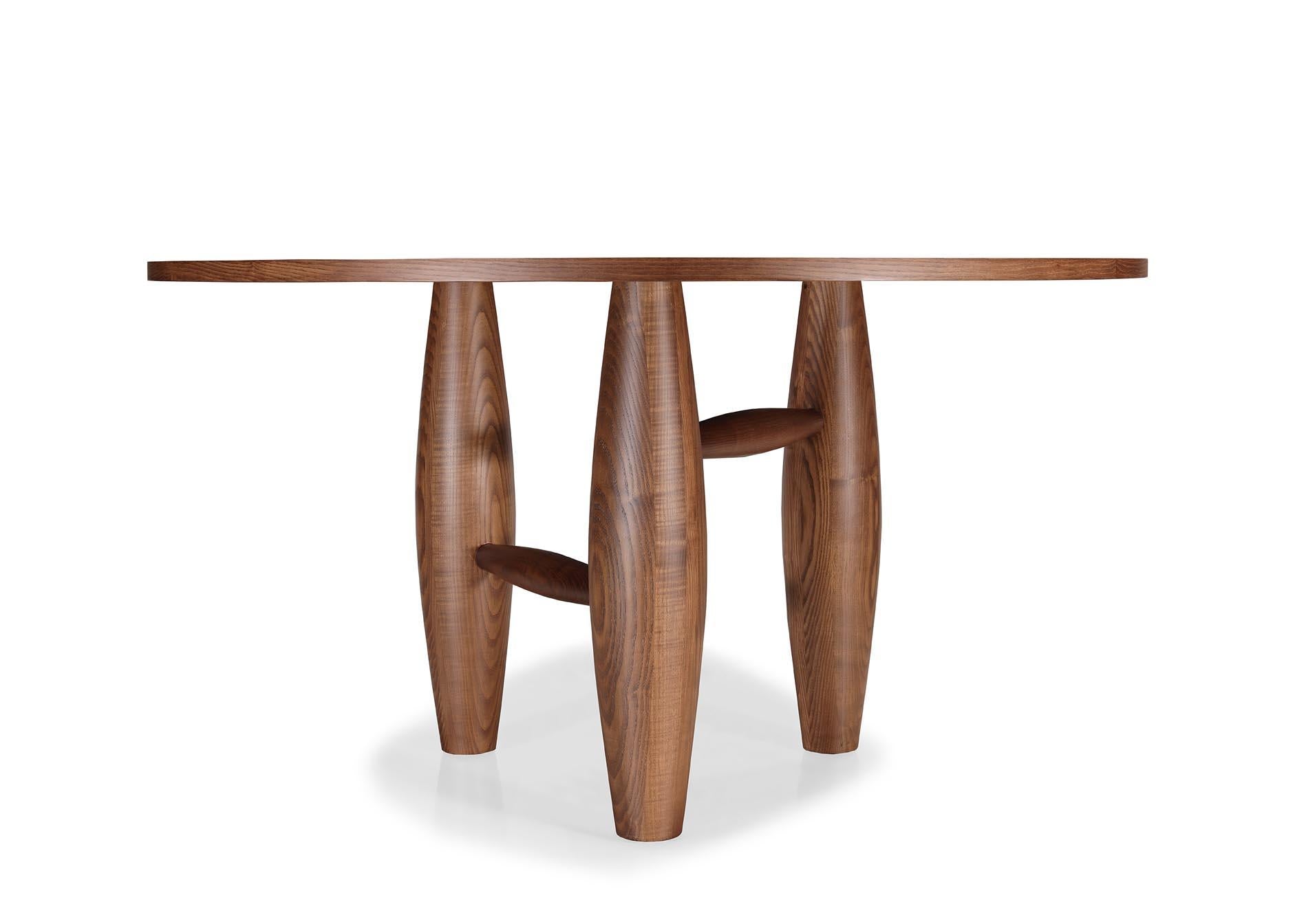 https://a.1stdibscdn.com/bao-round-dining-table-sculptural-curves-with-solid-wood-base-for-sale-picture-6/f_102612/f_433849421738174998316/RUBENSILVA_0041239_master.jpg