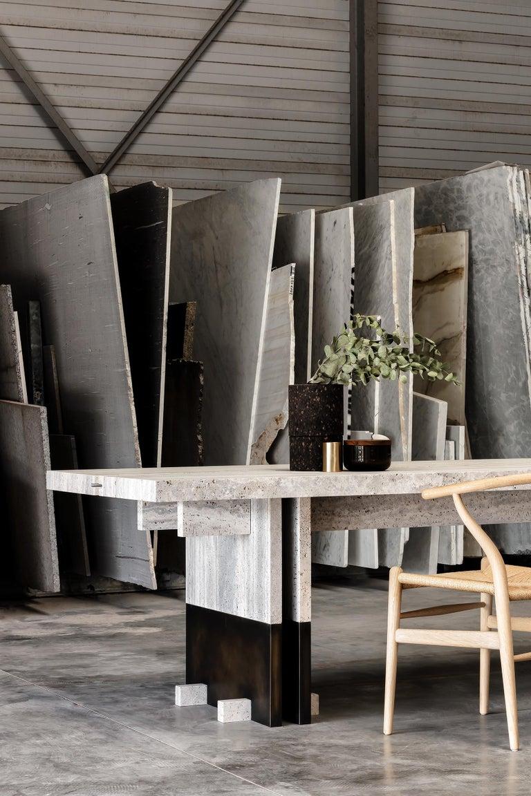 https://a.1stdibscdn.com/rift-travertin-dining-table-by-andy-kerstens-for-sale-picture-2/f_12192/f_318193821671474797434/Rift_Travertin_Dining_Table_by_Andy_Kerstens_2_master.jpg