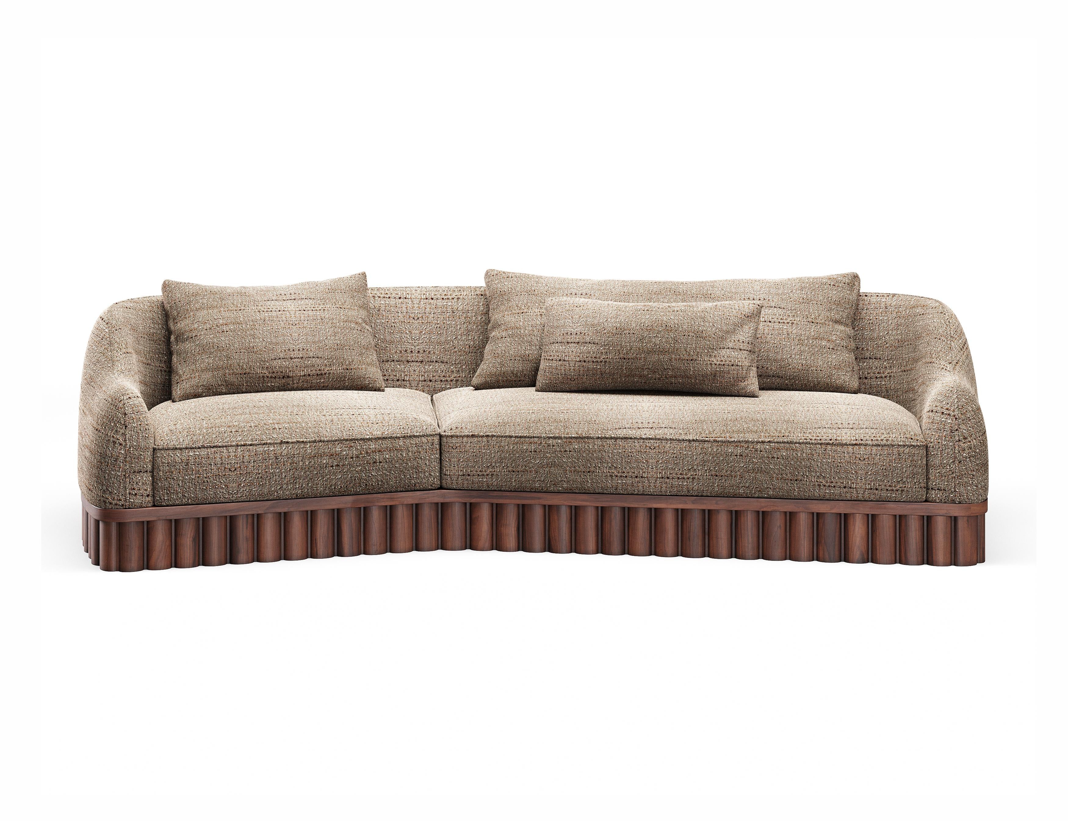 https://a.1stdibscdn.com/ripple-sofa-angular-curved-silhouette-with-sculptural-carved-wood-base-for-sale-picture-2/f_27693/f_456750821751342786656/Ripple_Wood_Sofa_A2_master.jpg