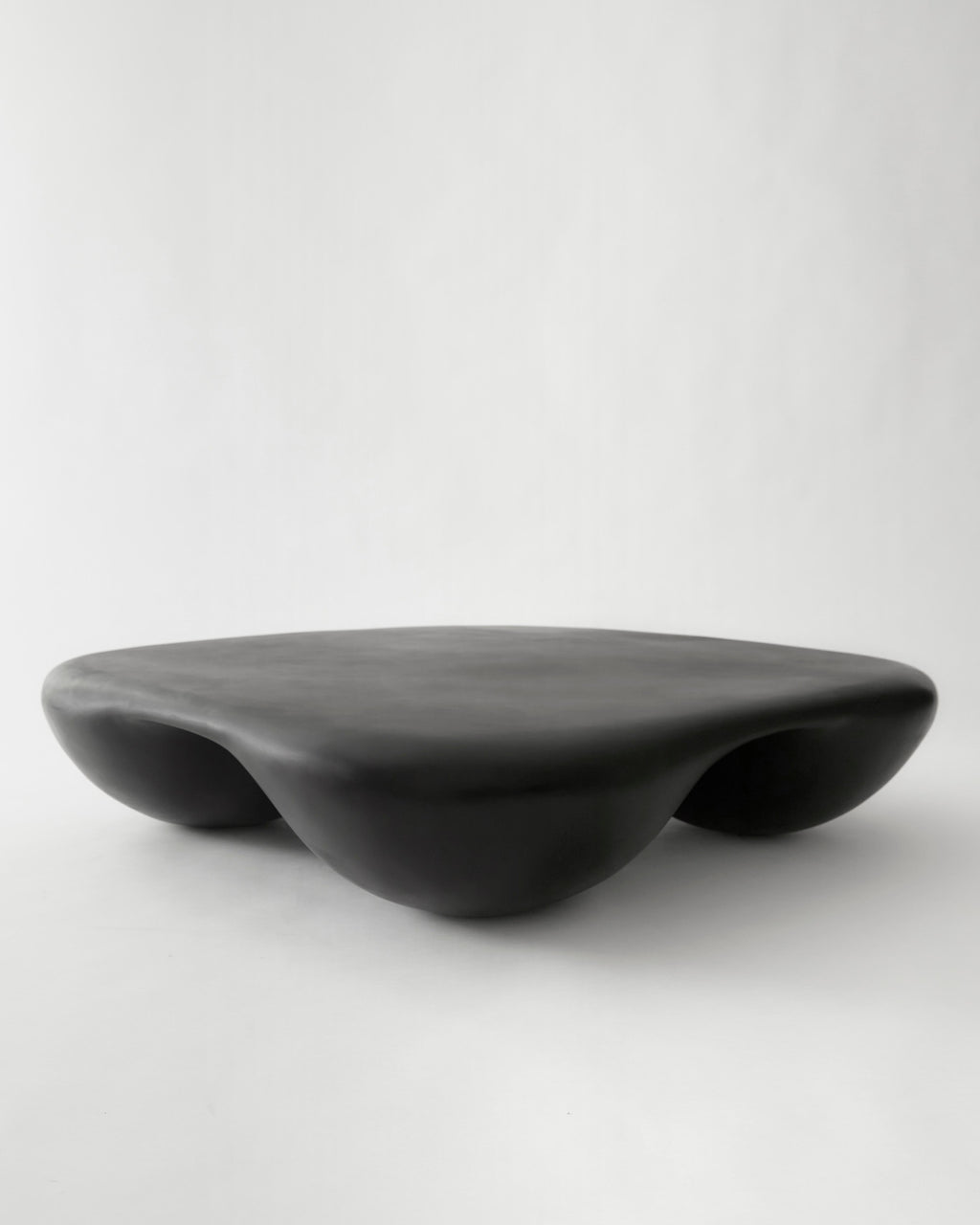 https://a.1stdibscdn.com/black-rounded-square-quad-coffee-table-in-stone-composite-by-mike-ruiz-serra-for-sale-picture-3/f_37133/f_329003021677262913708/Ruiz_Quad_Black1_master.jpg