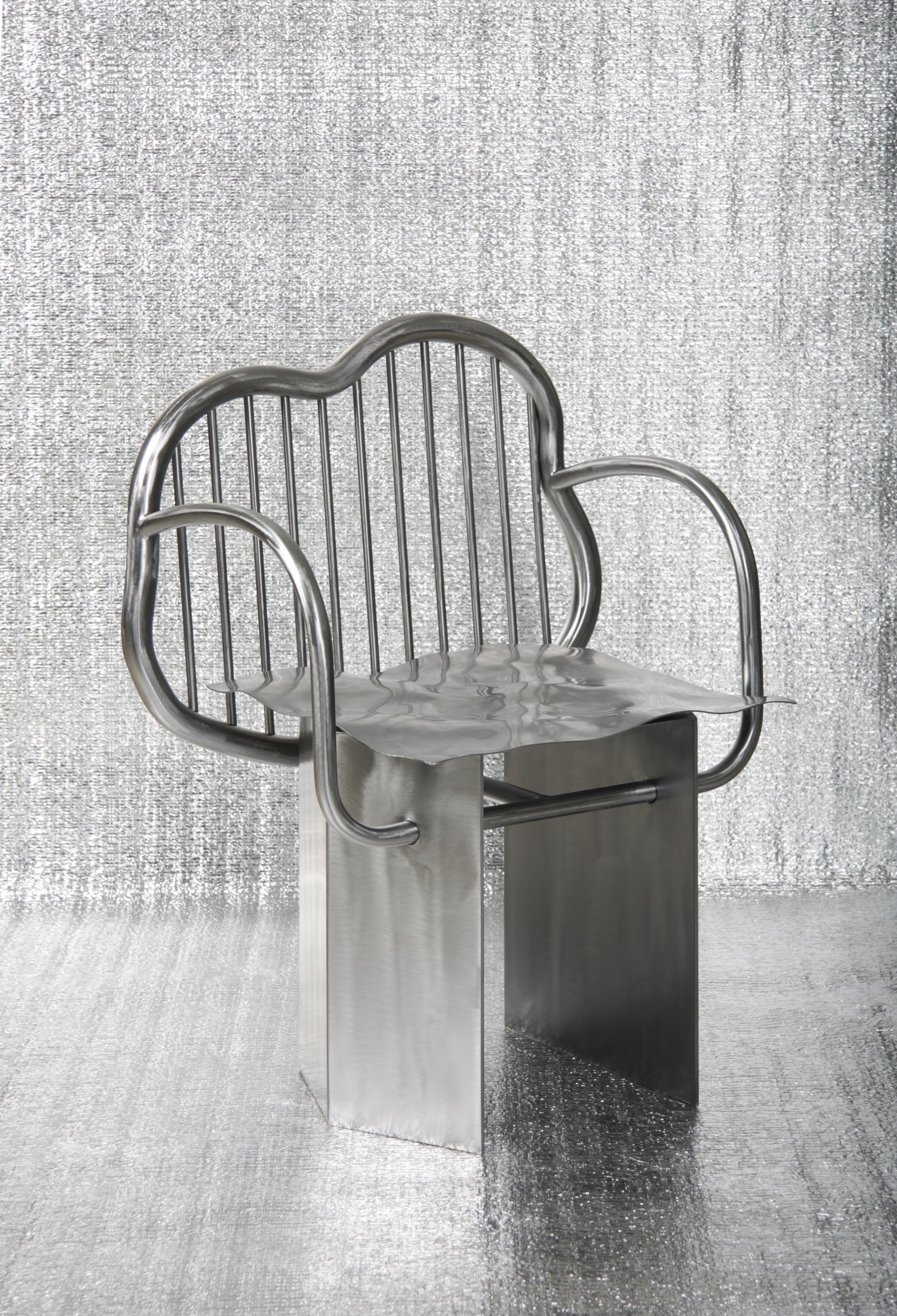 https://a.1stdibscdn.com/shiny-chair-in-stainless-steel-by-supaform-for-sale-picture-4/f_37993/f_182369321583591662329/SHINY_CHAIR_6_S_master.jpg