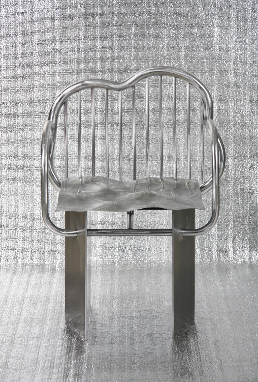 https://a.1stdibscdn.com/shiny-chair-in-stainless-steel-by-supaform-for-sale-picture-3/f_37993/f_182369321583591662753/SHINY_CHAIR_8_S_master.jpg