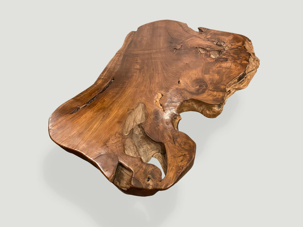 https://a.1stdibscdn.com/andrianna-shamaris-single-slab-live-edge-teak-wood-coffee-table-for-sale-picture-3/f_10806/1577382529321/SKU_250MR_41_x_32_x_16_high_x_3_slab_3980_trade_3200_master.jpeg