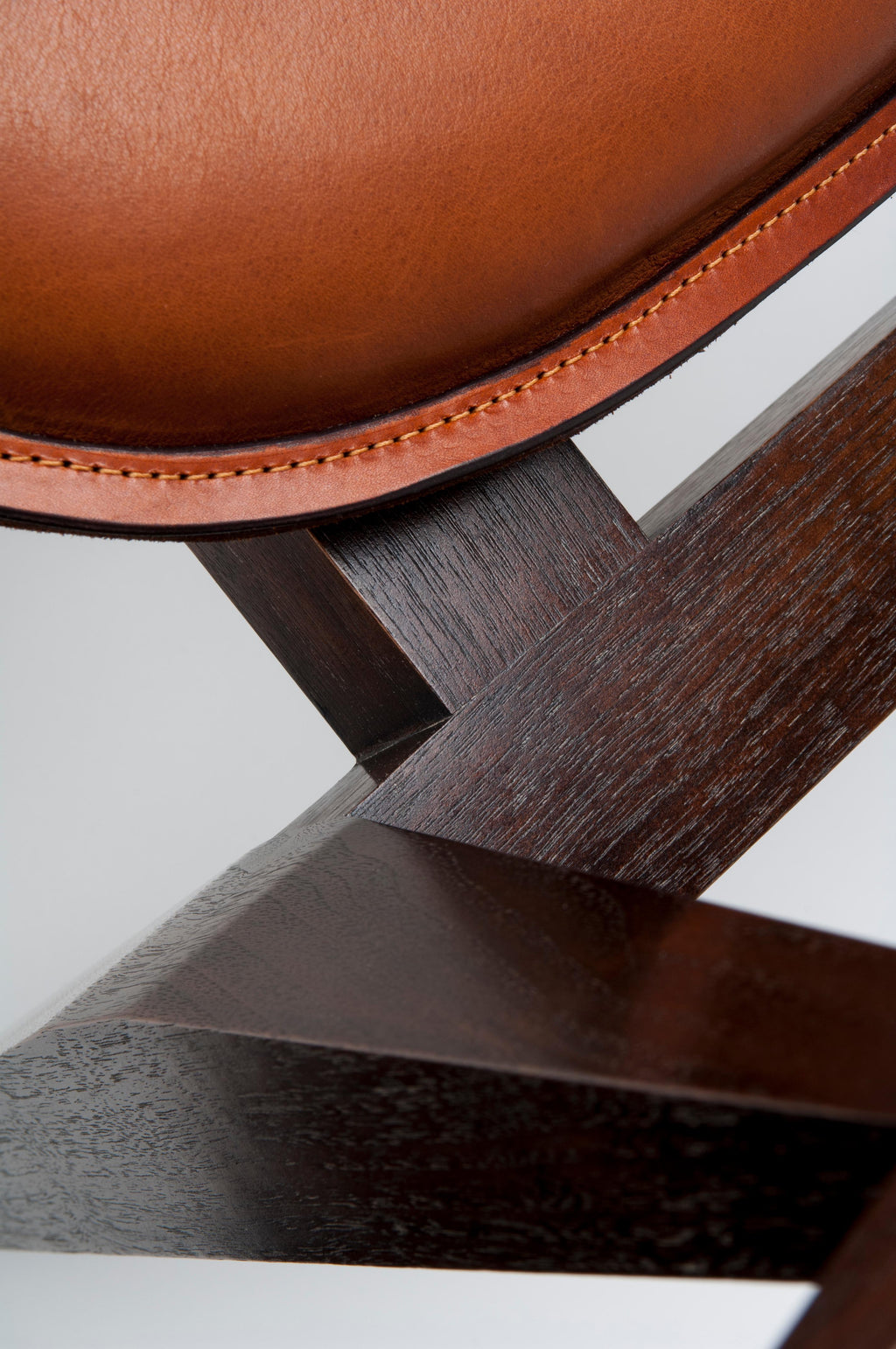 https://a.1stdibscdn.com/contemporary-constructor-armchair-in-tan-saddle-leather-and-solid-walnut-for-sale-picture-3/f_27813/f_136741511550147498227/SS163_master.jpg