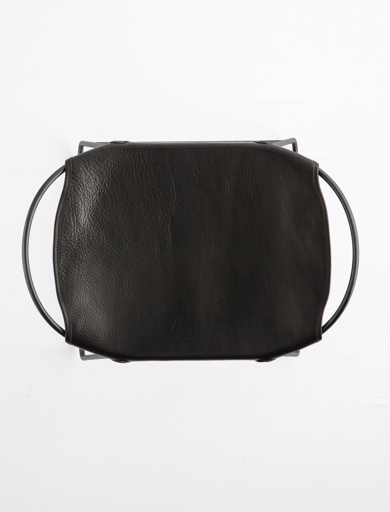 https://a.1stdibscdn.com/counter-stool-black-smoke-steel-and-vegetable-tanned-black-saddle-leather-for-sale-picture-3/f_40561/f_130695821545148095778/STOOL_Steel_BLACKSMOKE_Leather_BLACK_3_master.jpg?width=768