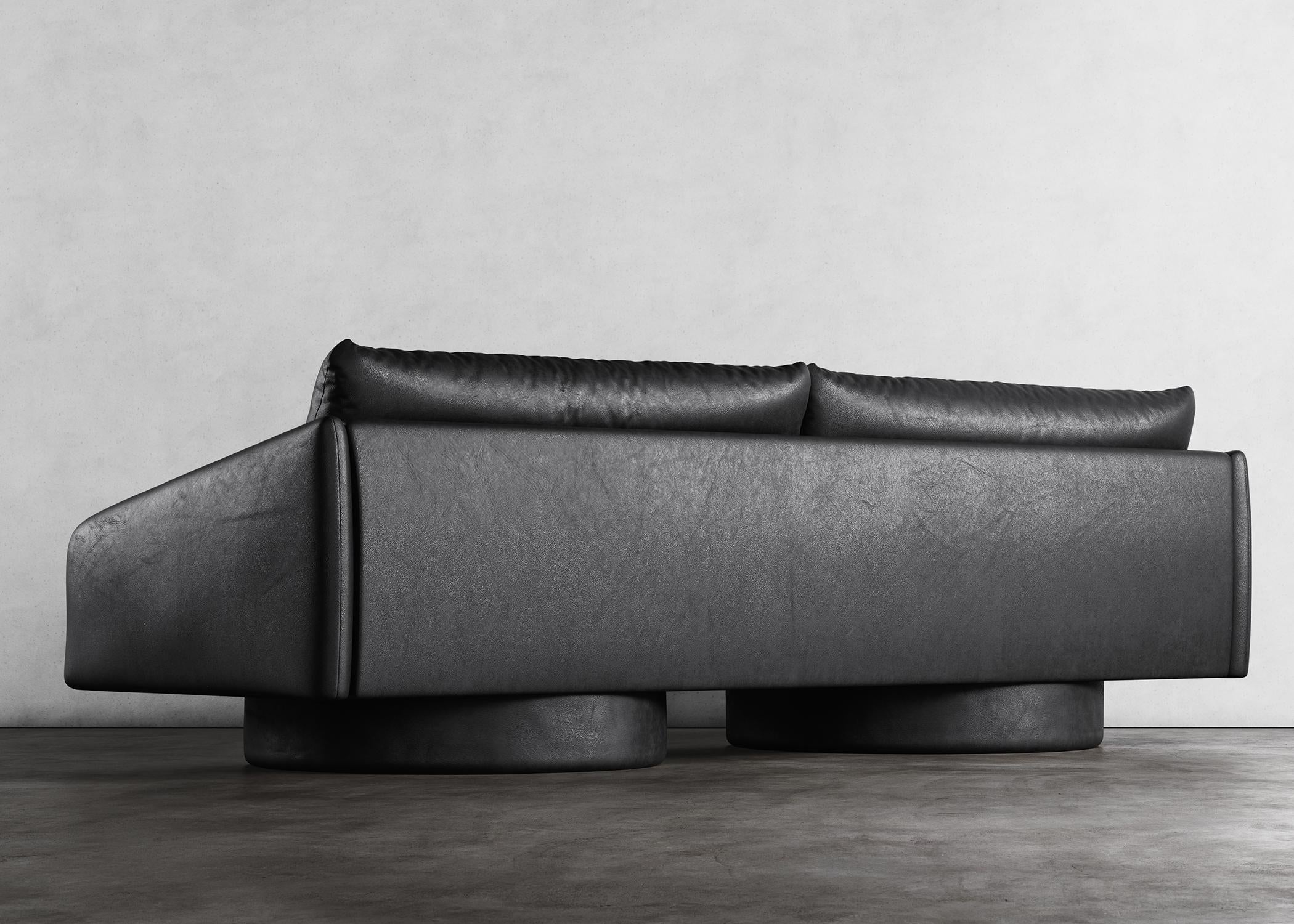 https://a.1stdibscdn.com/surge-sofa-modern-sofa-in-black-faux-lambskin-for-sale-picture-3/f_33283/f_329439921677200963023/SURGE_SOFA_1ST_DIBS_CROPS_1_master.jpg