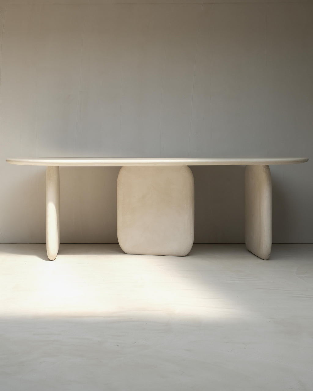 https://a.1stdibscdn.com/sabbia-solid-wood-and-colored-mineral-lime-plaster-dining-table-by-dennis-kaiser-for-sale-picture-2/f_12192/f_450212521747232257410/Sabbia_Table_4_master.jpg