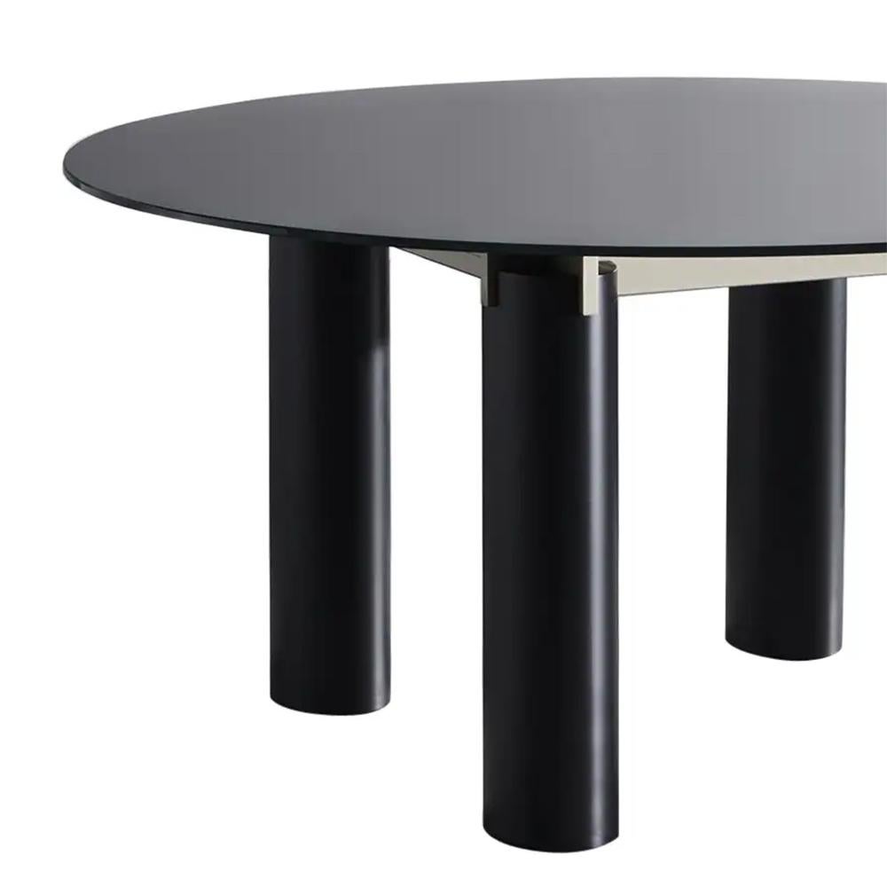 https://a.1stdibscdn.com/sober-round-dining-table-for-sale-picture-2/f_14282/f_303009221662477381927/Sans_titre_2_master.jpg