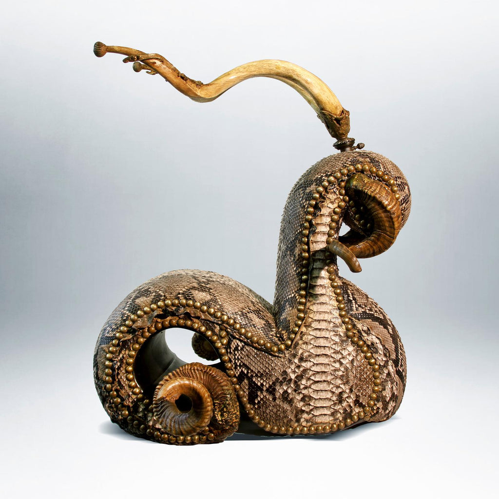https://a.1stdibscdn.com/python-medium-chair-with-polished-kudu-horns-for-sale-picture-4/f_14282/1542203561996/Sans_titre_3_master.jpg