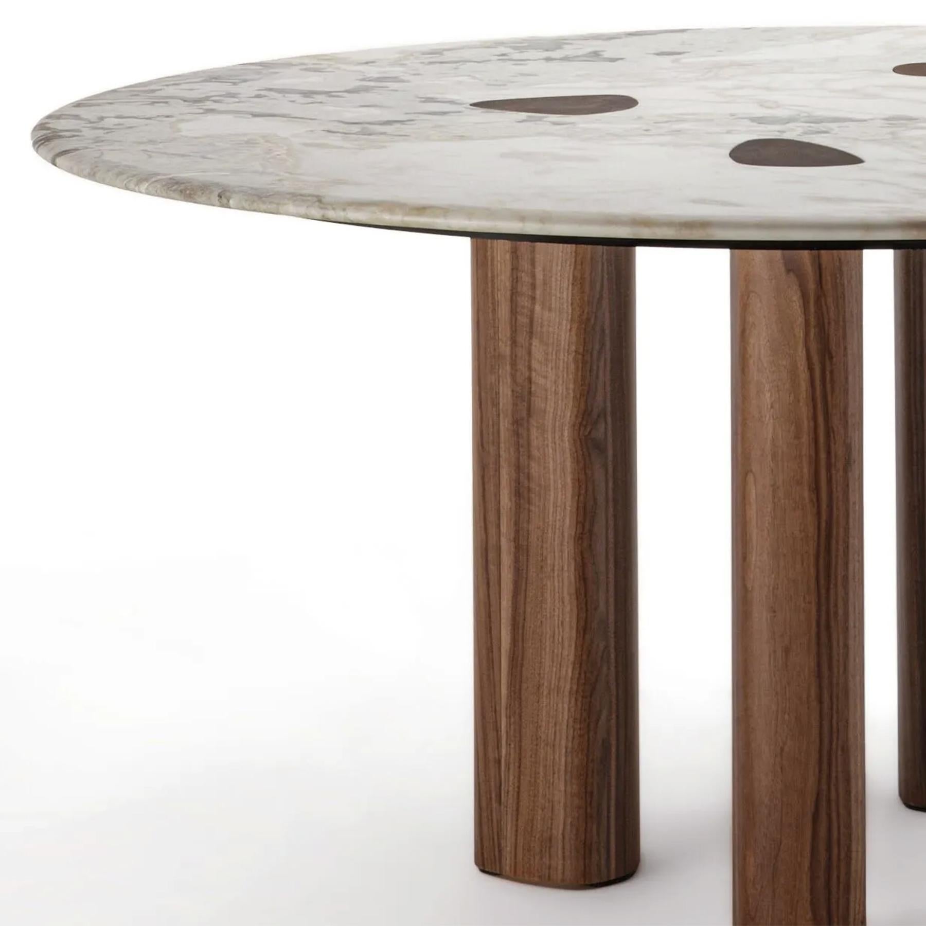 https://a.1stdibscdn.com/marbelesa-walnut-round-dining-table-for-sale-picture-4/f_14282/f_461877421754656604492/Sans_titre_4_master.jpg