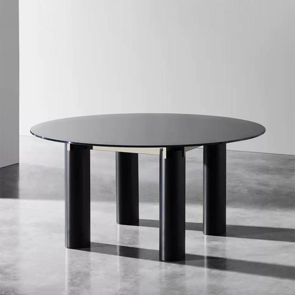 https://a.1stdibscdn.com/sober-round-dining-table-for-sale-picture-6/f_14282/f_303009221662477382114/Sans_titre_6_master.jpg