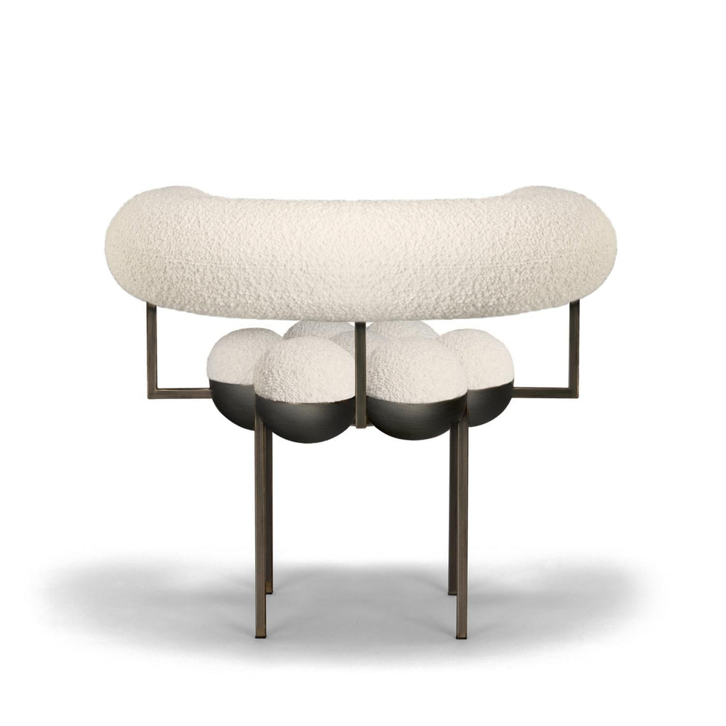 https://a.1stdibscdn.com/saturn-chair-bronze-oxidized-steel-and-cream-boucle-wool-by-lara-bohinc-in-stock-for-sale-picture-3/f_19173/f_220904821681992702121/Saturn_chair_Back_Cream_boucle_master.jpg