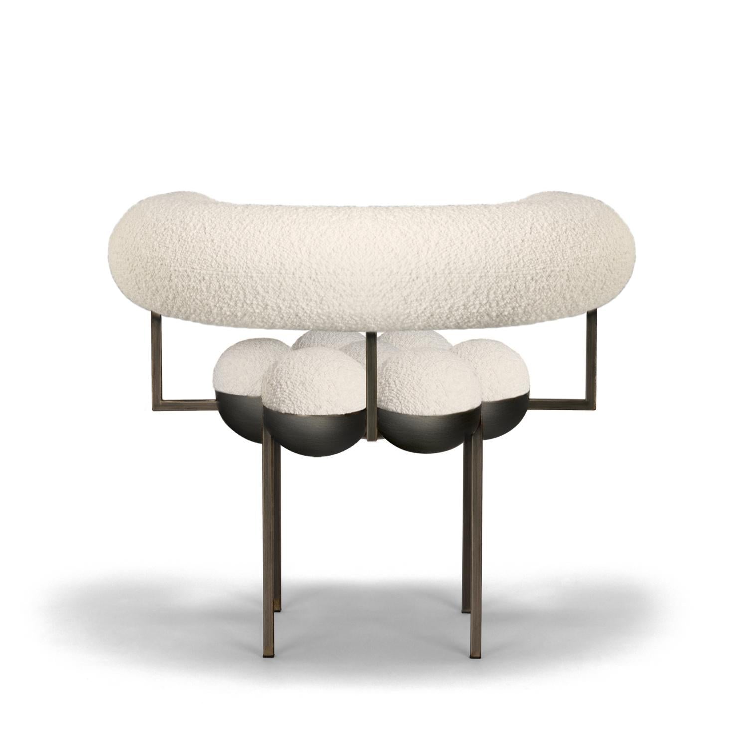 https://a.1stdibscdn.com/saturn-chair-bronze-oxidized-steel-and-cream-boucle-wool-by-lara-bohinc-in-stock-for-sale-picture-3/f_19173/f_220904821681992702121/Saturn_chair_Back_Cream_boucle_master.jpg