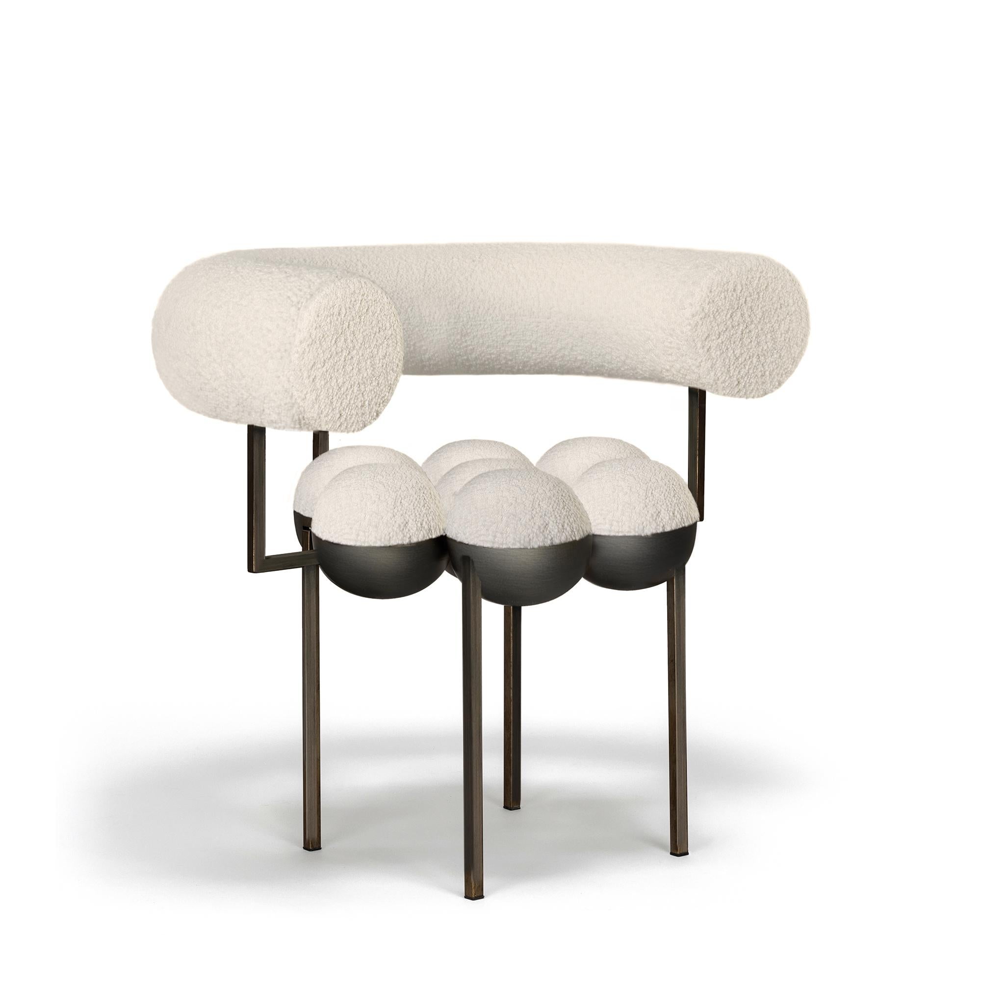 https://a.1stdibscdn.com/saturn-chair-bronze-oxidized-steel-and-cream-boucle-wool-by-lara-bohinc-in-stock-for-sale-picture-2/f_19173/f_220904821681992702867/Saturn_chair_Quarter_Cream_boucle_master.jpg