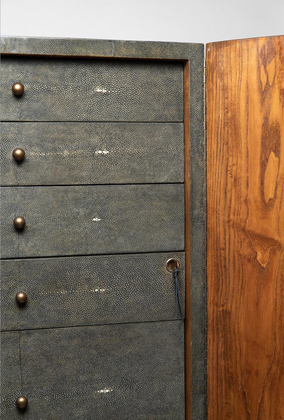 https://a.1stdibscdn.com/shagreen-jewelry-cabinet-by-ry-augousti-for-sale-picture-6/f_45491/f_235246221619419134514/Screenshot_2021_04_26_at_08_37_36_master.jpg