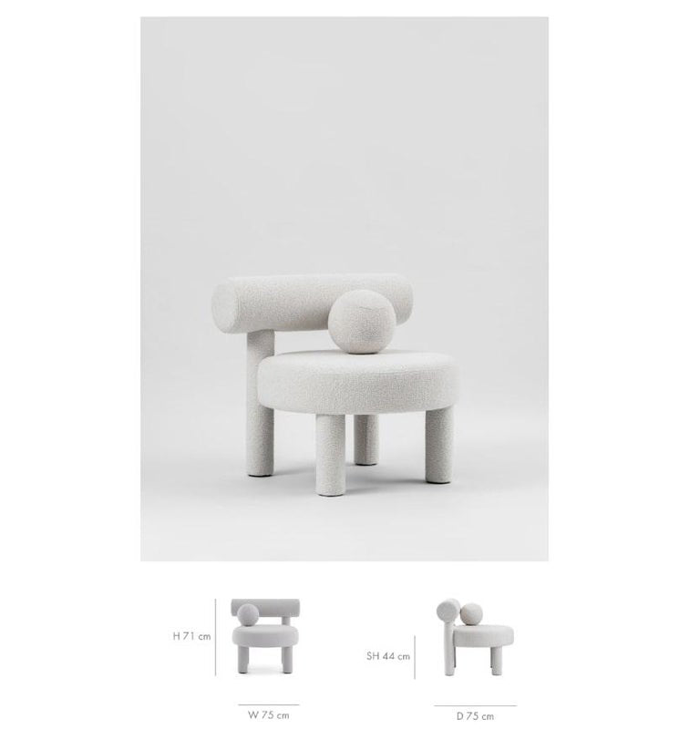 https://a.1stdibscdn.com/modern-low-chair-gropius-cs2-fluffy-in-azur-faux-fur-with-wooden-legs-by-noom-for-sale-picture-5/f_42321/f_422472121752656063758/Screenshot_2025_07_15_at_11_45_13_master.jpg?width=768
