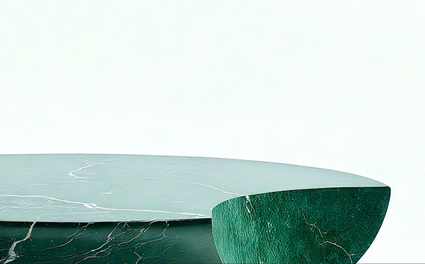 https://a.1stdibscdn.com/milo-sculptural-green-marble-coffee-table-with-asymmetrical-crescent-accent-for-sale-picture-7/f_97222/f_459177921752781105863/Screenshot_2025_07_18_at_1_03_32_AM_master.jpg