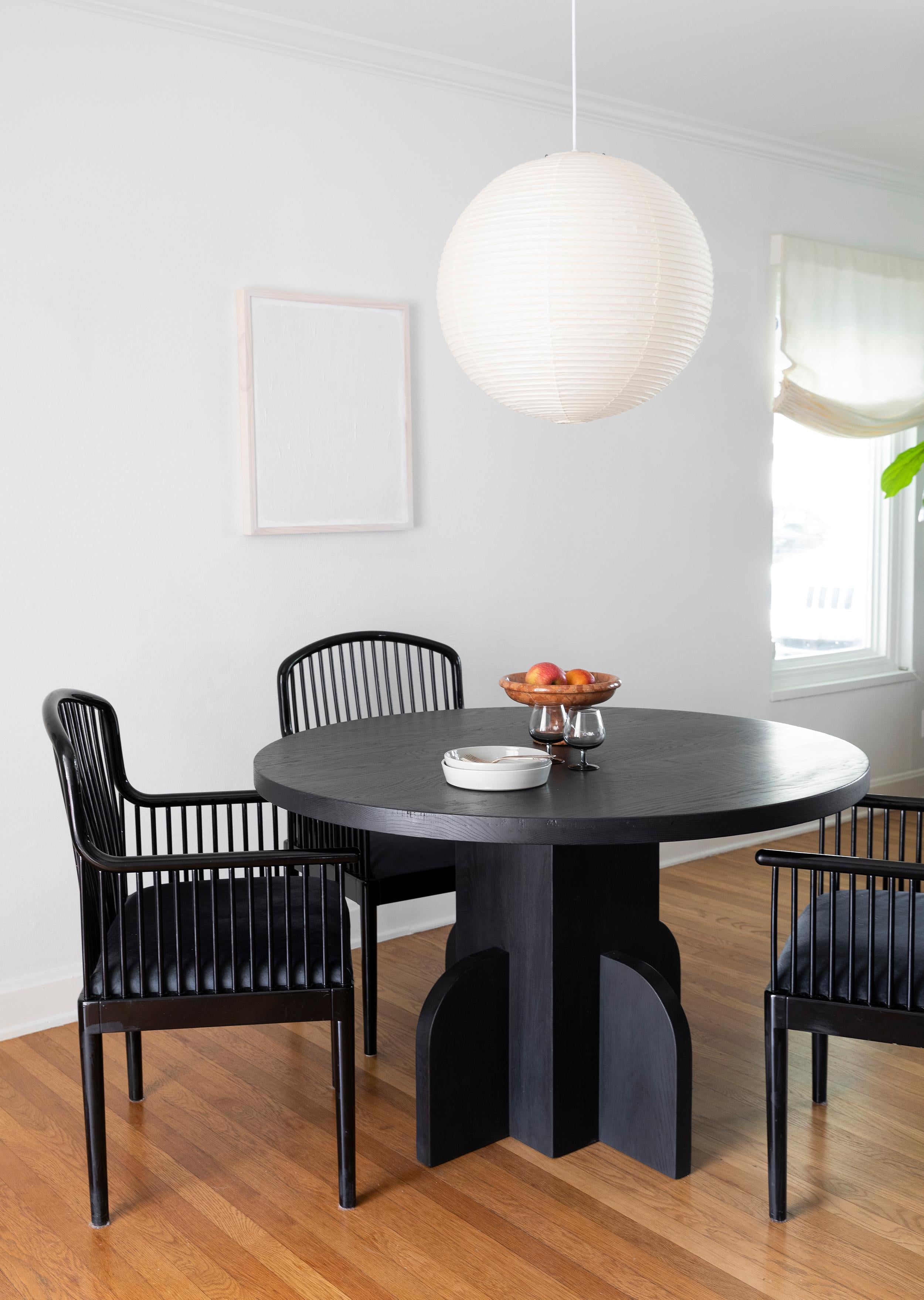 https://a.1stdibscdn.com/round-48-inch-ratio-dining-table-in-ebonized-white-oak-by-seer-studio-for-sale-picture-4/f_37133/1589336297534/SeerStudio1_master.JPG