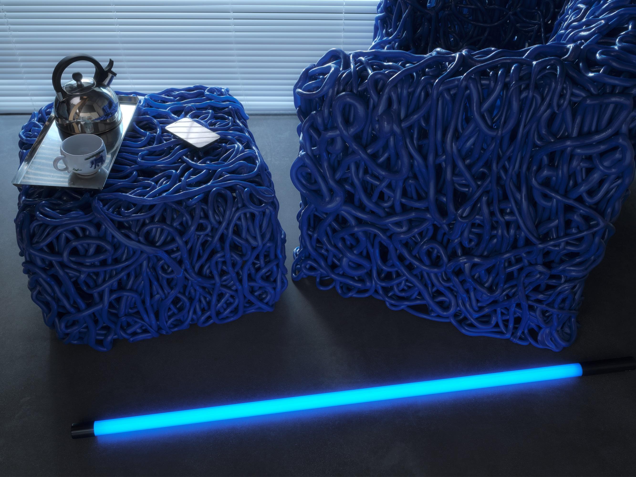 https://a.1stdibscdn.com/senzafine-armchair-pouf-in-polyurethane-blue-by-gaetano-pesce-for-sale-picture-5/56838172/f_445316421744773873190/Senzafine_Ambient_2_master_master.jpg