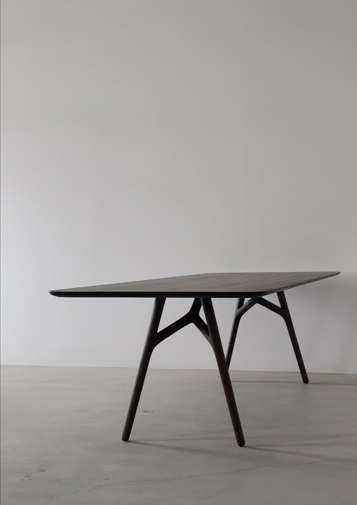 https://a.1stdibscdn.com/furcula-modern-solid-wood-dining-table-by-izm-design-for-sale-picture-4/f_51211/f_195104521592332645344/Shane_s_phone_036_master.jpg