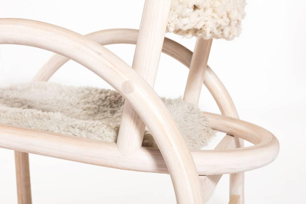 https://a.1stdibscdn.com/archivesE/upload/f_31443/f_91652311511468538288/Shepherd_Chair_wht_wood_natural_wool_side_detail_lores_master.jpg