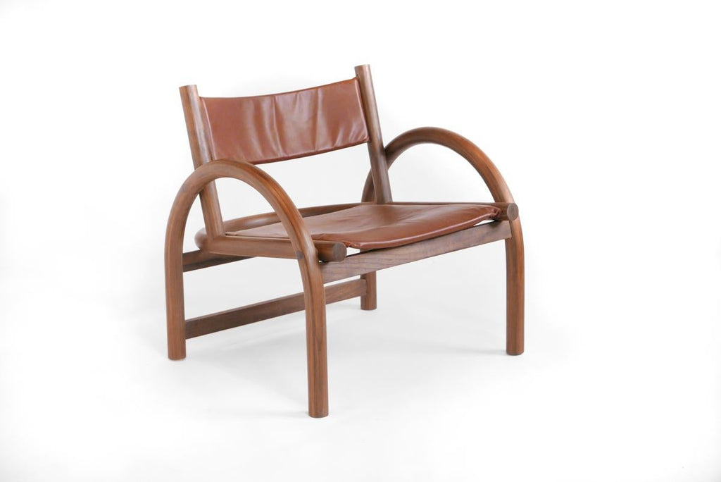 https://a.1stdibscdn.com/shepherds-chair-in-solid-bent-american-black-walnut-and-veg-tanned-leather-for-sale-picture-2/f_31443/f_108008531542743301084/ShepherdsChair_Leather_master.jpg
