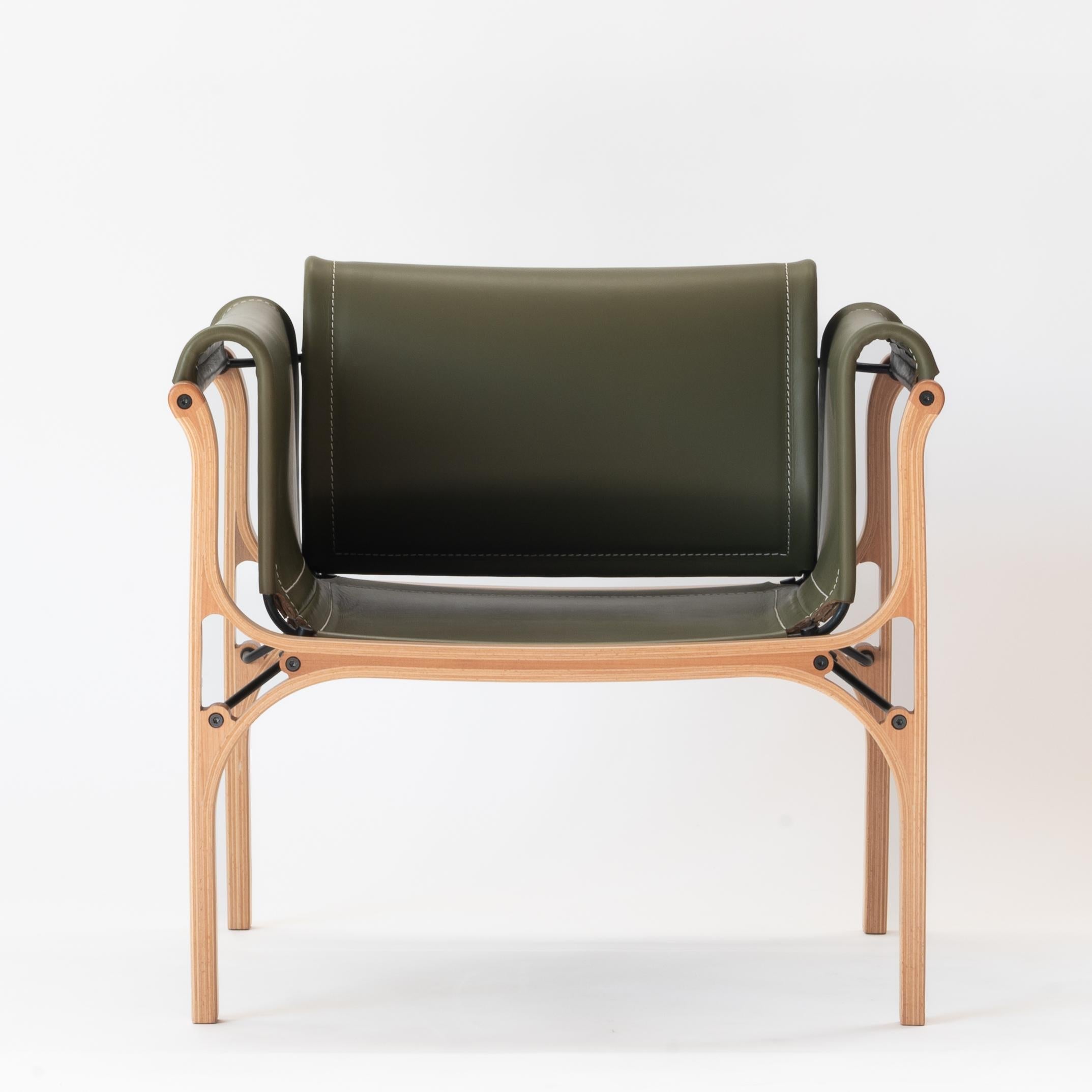 https://a.1stdibscdn.com/h-armchair-by-cristian-valdes-1977-laminated-wood-leather-green-for-sale-picture-2/f_108172/f_493713421774453579955/Sillo_n_H_frente_verde_master.jpg