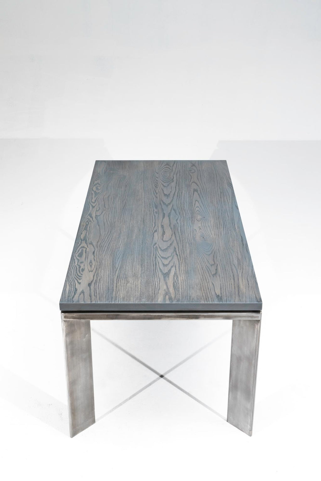 https://a.1stdibscdn.com/slate-gray-ashwood-dining-table-on-brushed-steel-base-charlevoix-dining-table-for-sale-picture-5/f_47361/1563050730864/Silver_001_master.jpg