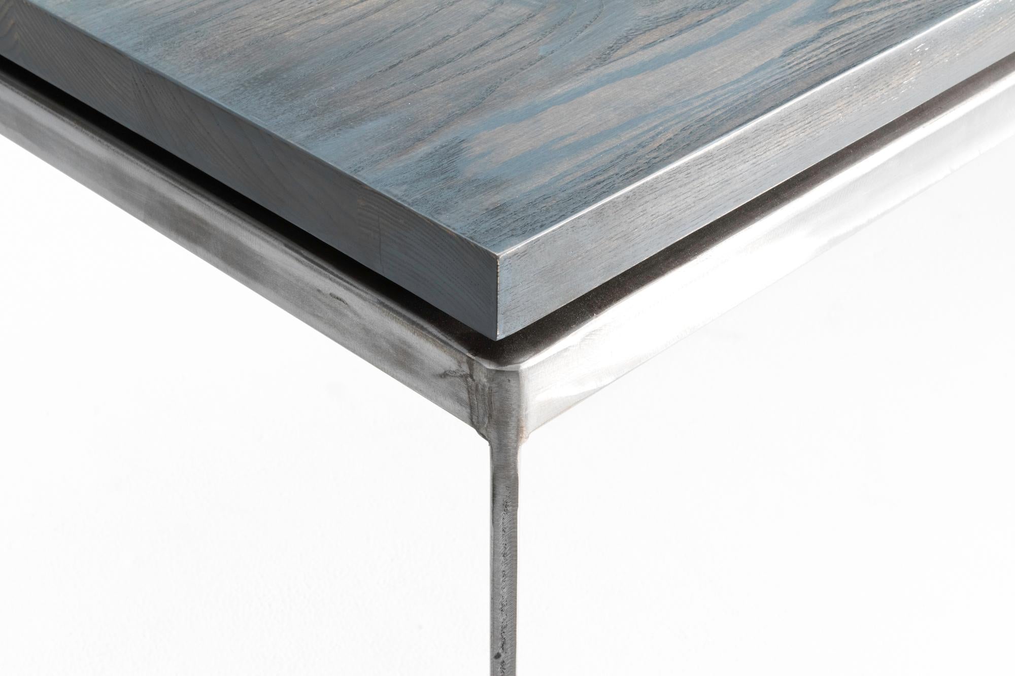 https://a.1stdibscdn.com/slate-gray-ashwood-dining-table-on-brushed-steel-base-charlevoix-dining-table-for-sale-picture-3/f_47361/1563050727622/Silver_003_master.jpg