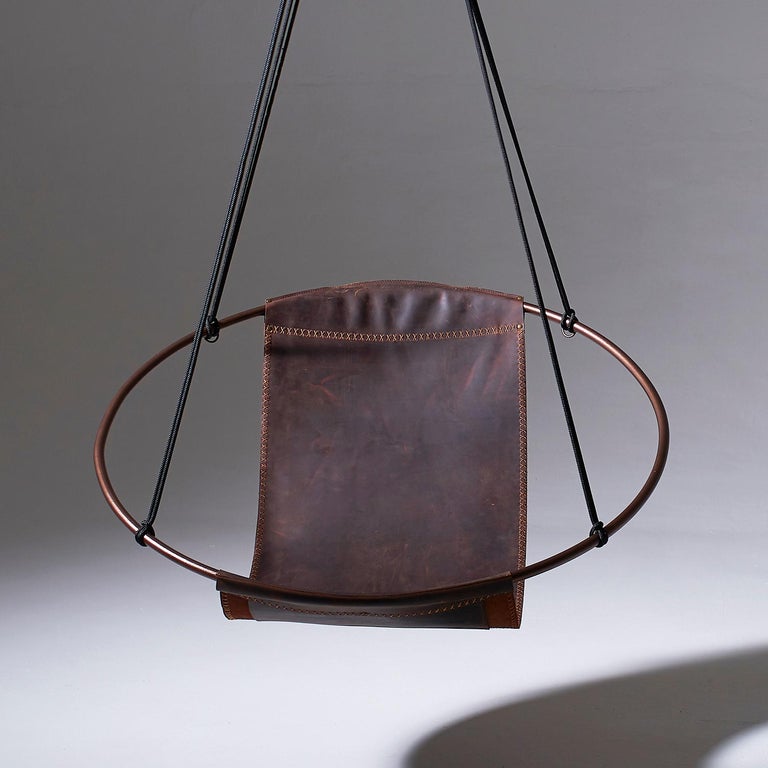 https://a.1stdibscdn.com/sling-oil-tanned-leather-brown-for-sale-picture-4/f_32773/f_214387821610186733462/Sling_chair_Texan_OIL_FRONT_master.jpg?width=768