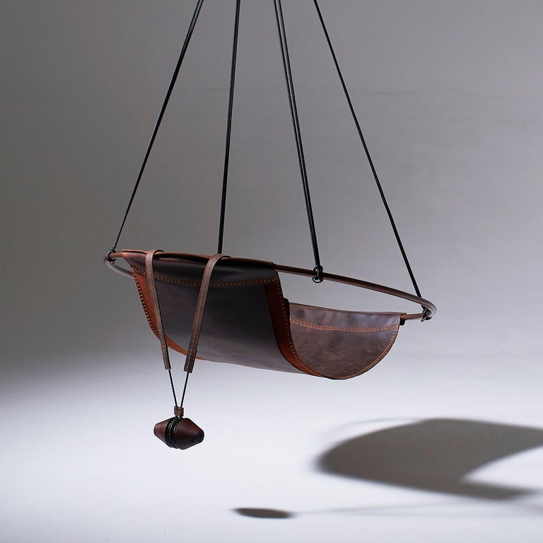 https://a.1stdibscdn.com/sling-oil-tanned-leather-brown-for-sale-picture-2/f_32773/f_214387821610186716954/Sling_chair_Texan_OIL_back_master.jpg?width=768