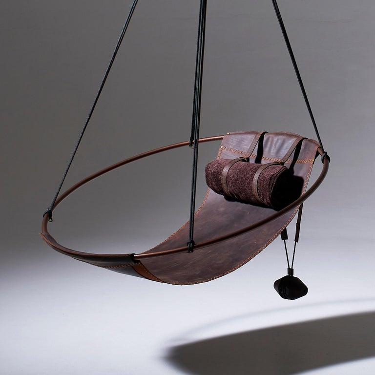 https://a.1stdibscdn.com/sling-oil-tanned-leather-brown-for-sale-picture-3/f_32773/f_214387821610186719566/Sling_chair_Texan_OIL_bolster_chenile_master.jpg?width=768