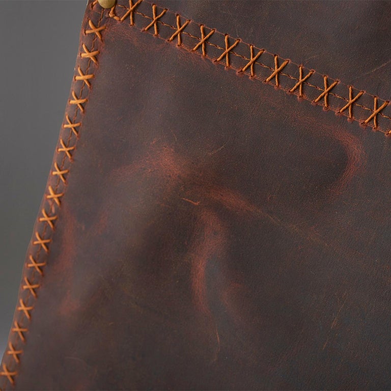https://a.1stdibscdn.com/sling-oil-tanned-leather-brown-for-sale-picture-5/f_32773/f_214387821610186726824/Sling_chair_Texan_OIL_detail_grey_2_master.jpg?width=768