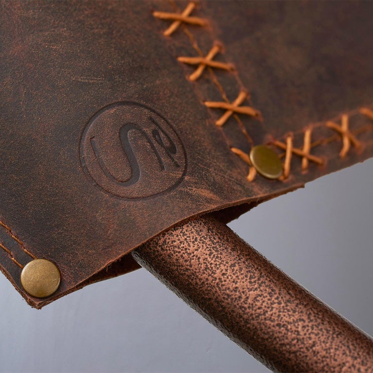 https://a.1stdibscdn.com/sling-oil-tanned-leather-brown-for-sale-picture-6/f_32773/f_214387821610186728604/Sling_chair_Texan_OIL_detail_grey_3_master.jpg?width=768