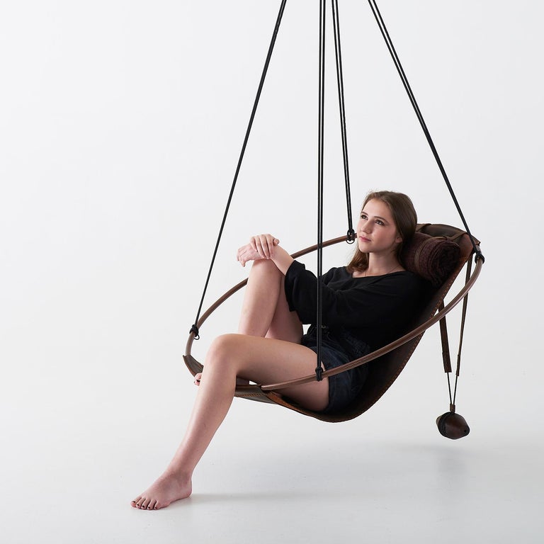 https://a.1stdibscdn.com/sling-oil-tanned-leather-brown-for-sale-picture-10/f_32773/f_214387821610186734966/Sling_chair_Texan_OIL_model_2_master.jpg?width=768