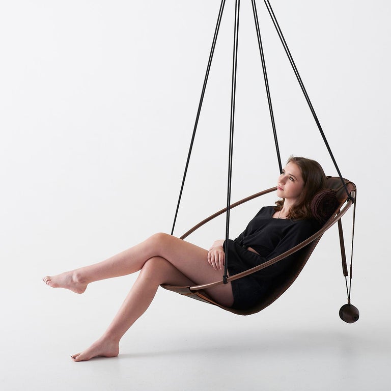 https://a.1stdibscdn.com/sling-oil-tanned-leather-brown-for-sale-picture-11/f_32773/f_214387821610186736478/Sling_chair_Texan_OIL_model_3_master.jpg?width=768
