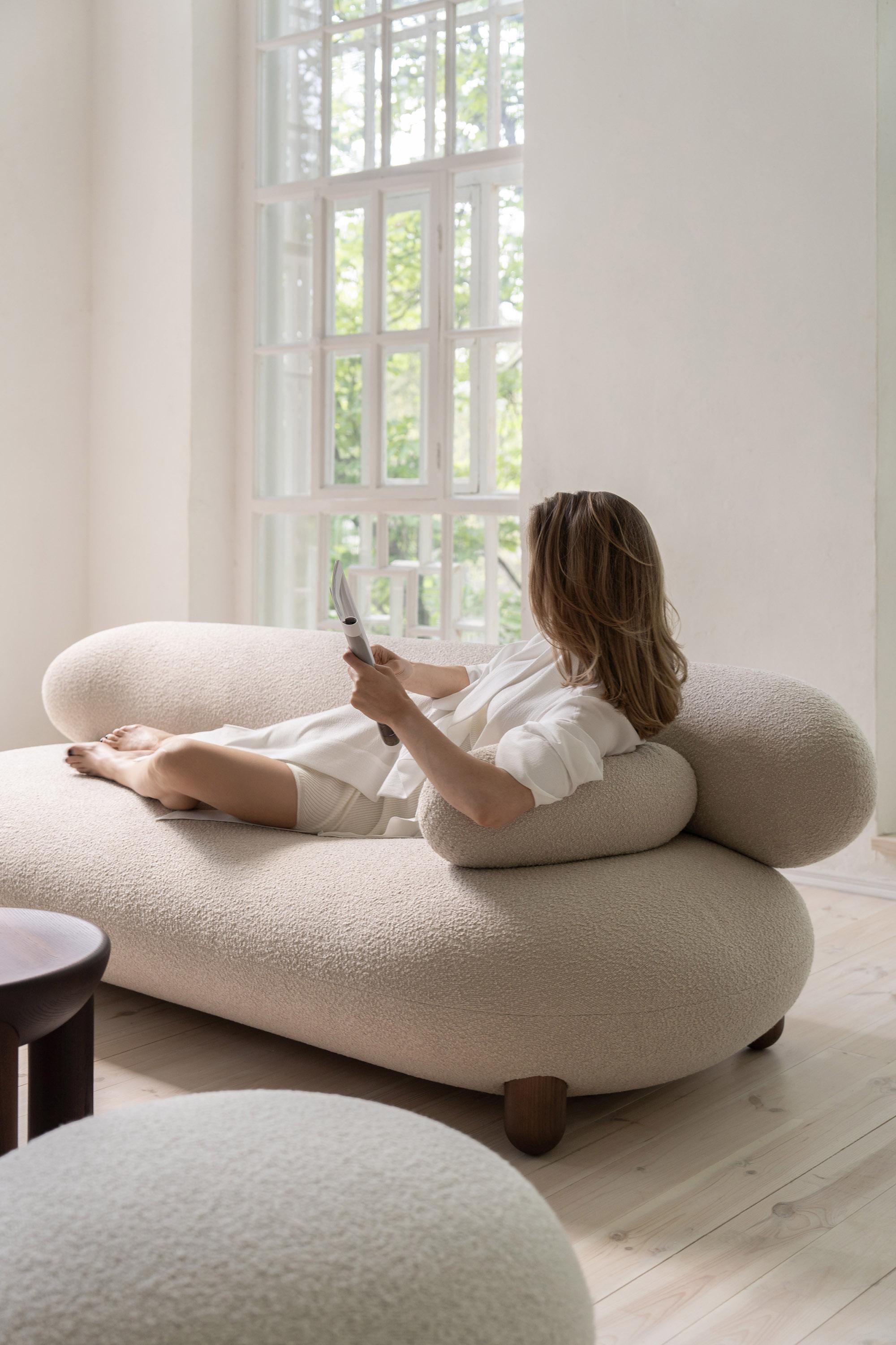 https://a.1stdibscdn.com/modern-lounge-flock-sofa-in-boucle-fabric-width-240-cm-by-noom-for-sale-picture-6/f_42321/f_450609821747420388391/Sofa_Flock_in_interior_by_NOOM_4_sm_master.jpg