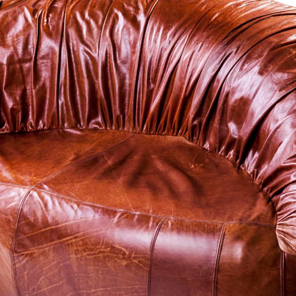 https://a.1stdibscdn.com/pangolin-pleated-leather-contemporary-retro-style-sofa-by-egg-designs-for-sale-picture-2/f_38931/1541063592948/Sofa_Parys_View2_master.jpg