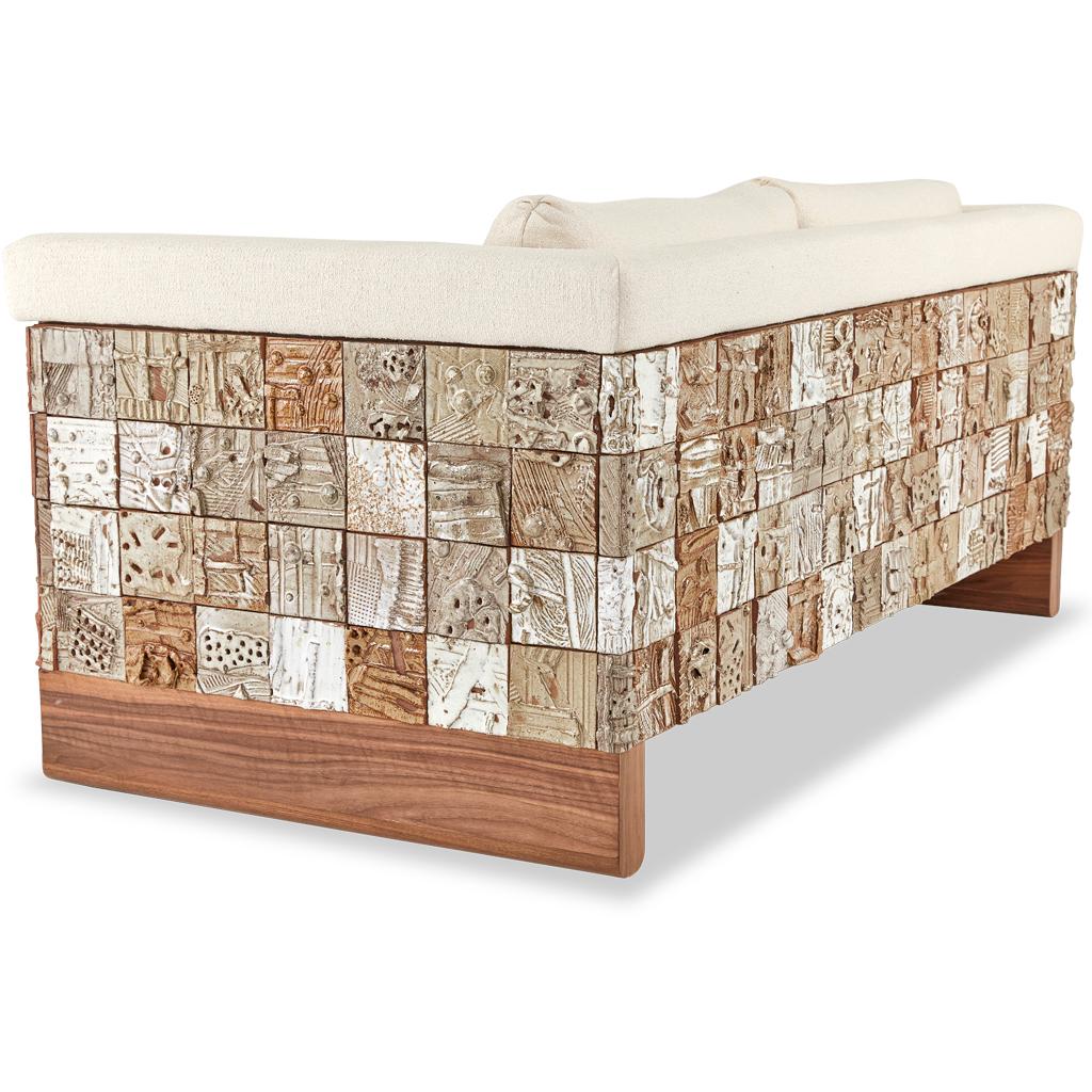 https://a.1stdibscdn.com/stellar-modern-handmade-ceramic-walnut-boucle-upholstered-luxury-sofa-for-sale-picture-4/f_38931/f_256571221633877416010/Sofa_Stellar_View6_master.jpg