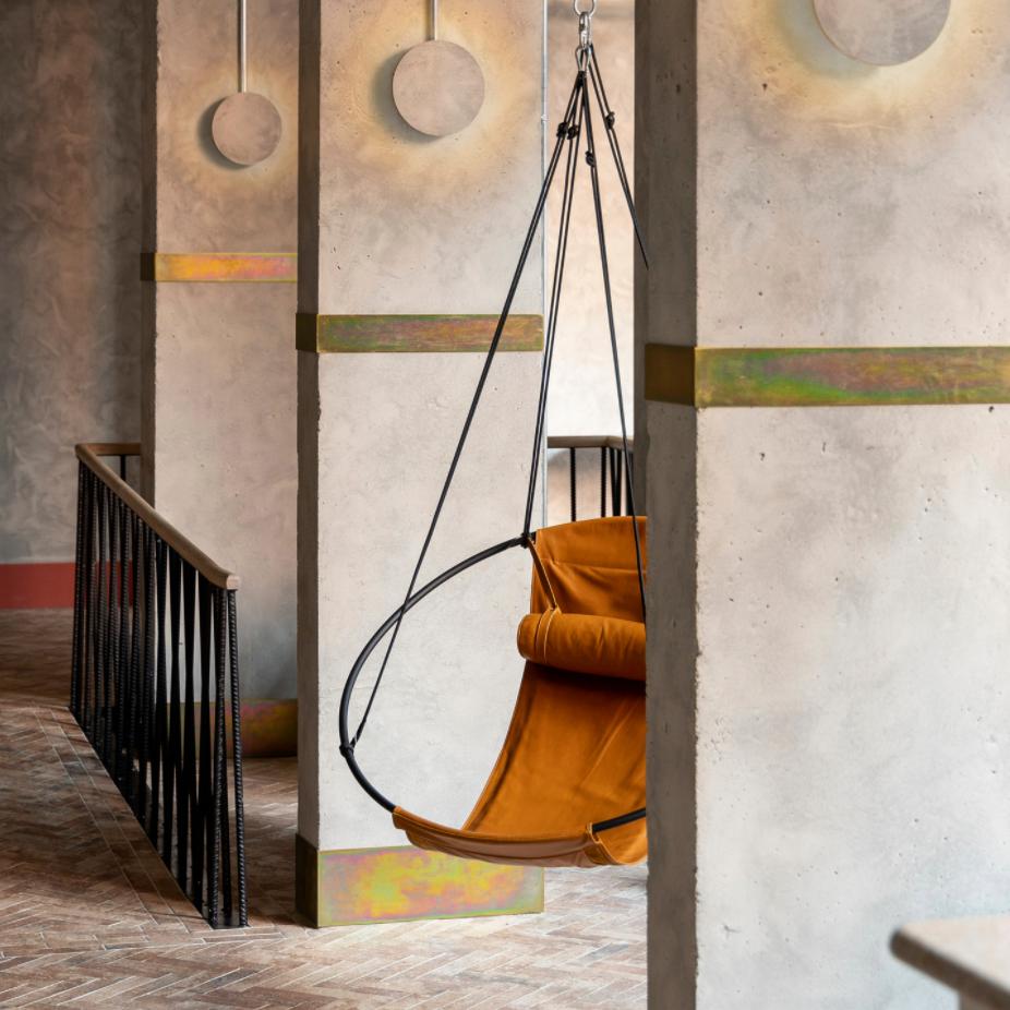 https://a.1stdibscdn.com/contemporary-genuine-leather-mild-steel-hanging-sling-chair-in-brown-ochre-for-sale-picture-4/f_32773/f_312695521668170420814/Soft_Leather_Variant_Ochre_Ambient_1_master.jpg