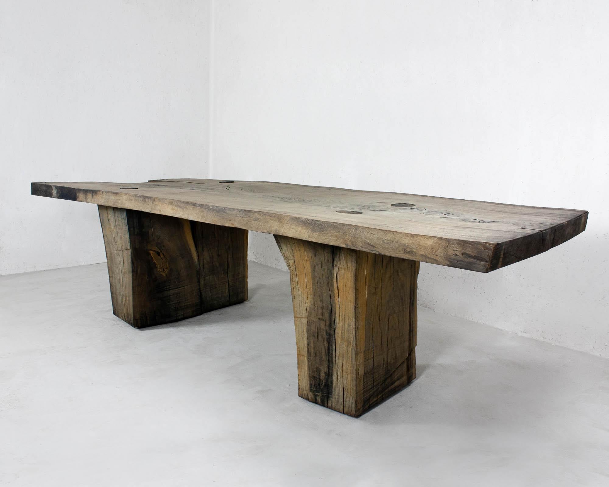 https://a.1stdibscdn.com/sculpted-massive-dining-table-v5-in-solid-oakwood-custom-size-for-sale-picture-2/f_31233/f_234073921618583201030/Soha_Massive_Table_Oak_ter_master.jpg