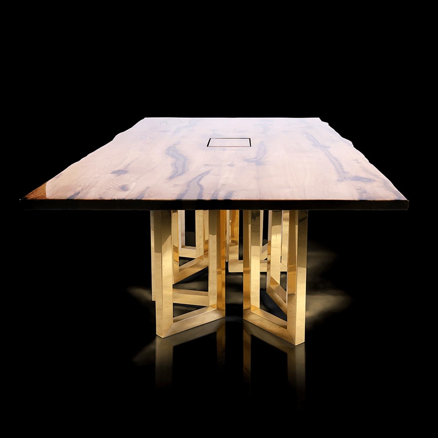 https://a.1stdibscdn.com/bespoke-large-oak-office-table-with-polished-brass-legs-and-socket-block-for-sale-picture-5/f_55202/f_216561221606998497680/Soho_on_black_master.jpg