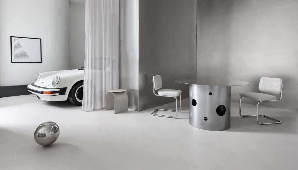 https://a.1stdibscdn.com/contemporary-21st-century-silos-dining-table-by-spinzi-in-hammered-gunmetal-grey-for-sale-picture-6/32076752/f_378902921704970947103/Spinzi_RE_SET_2022_04_master_master.jpg
