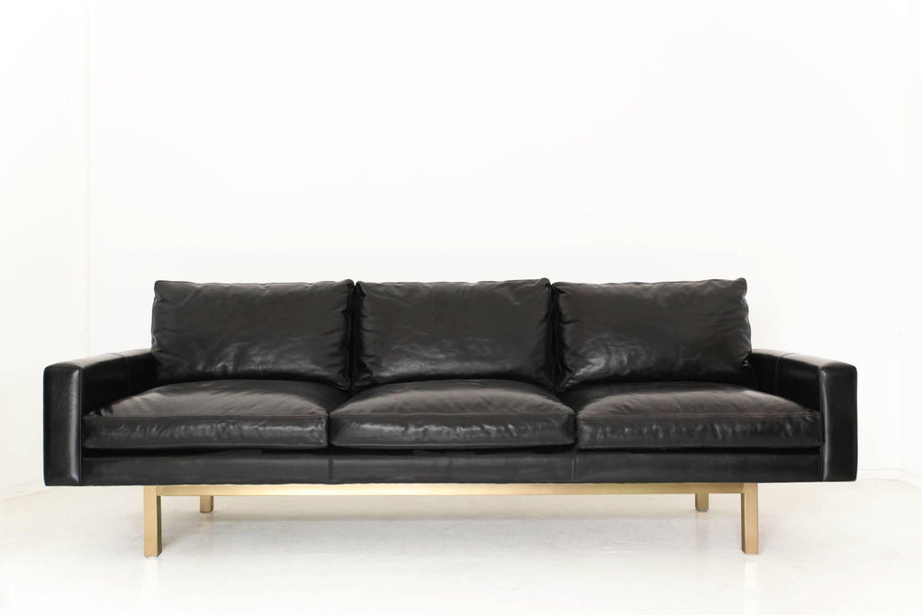 https://a.1stdibscdn.com/contemporary-x-large-standard-sofa-in-caramel-leather-with-walnut-base-for-sale-picture-6/f_29663/f_196154721593055604138/St_Sofa_black_brass_master.jpg
