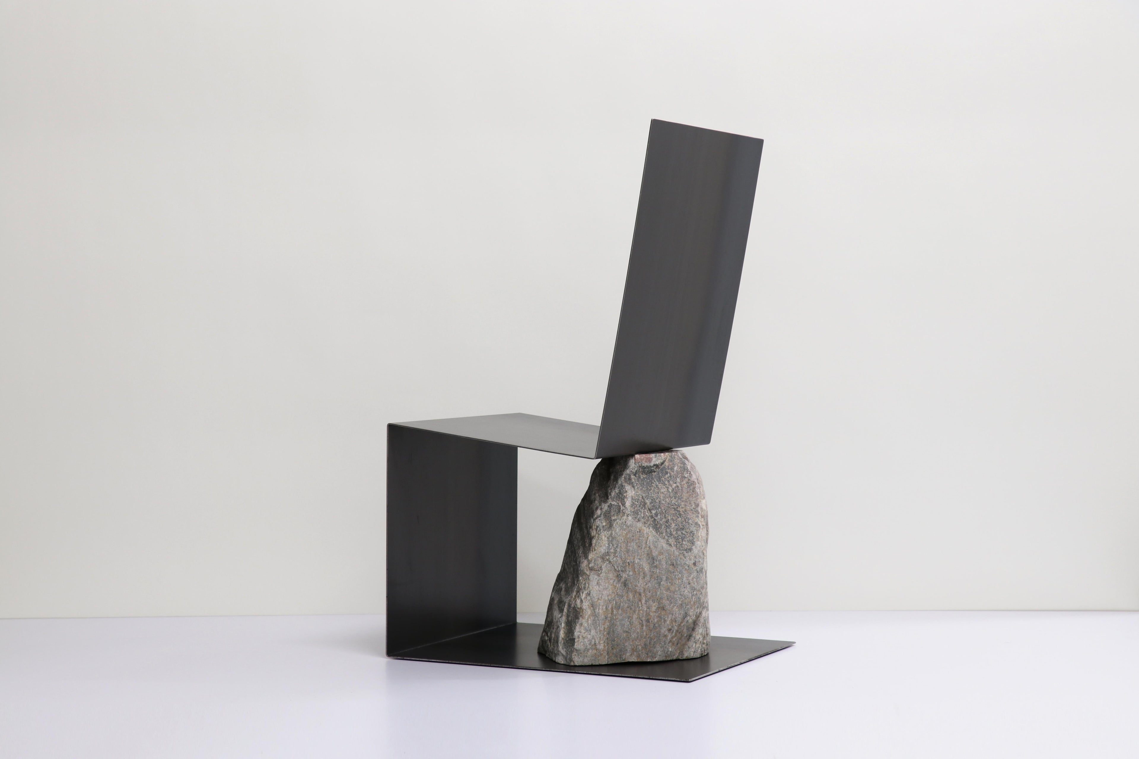 https://a.1stdibscdn.com/steel-and-stone-chair-by-batten-and-kamp-for-sale-picture-2/f_12192/f_319184621704910846238/Steel_and_Stone_lounge_chair_hot_rolled_Edition_4_B_master.jpg